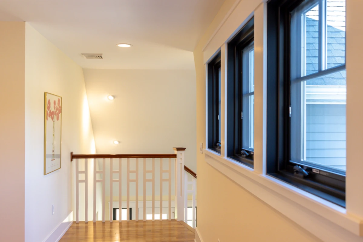 Black windows trimmed out on an interior wall