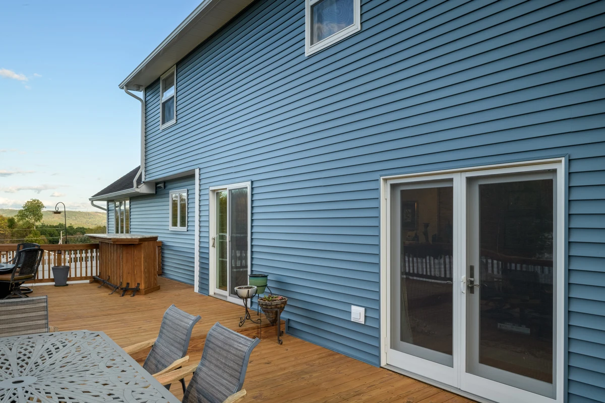 New blue siding on the back of a house