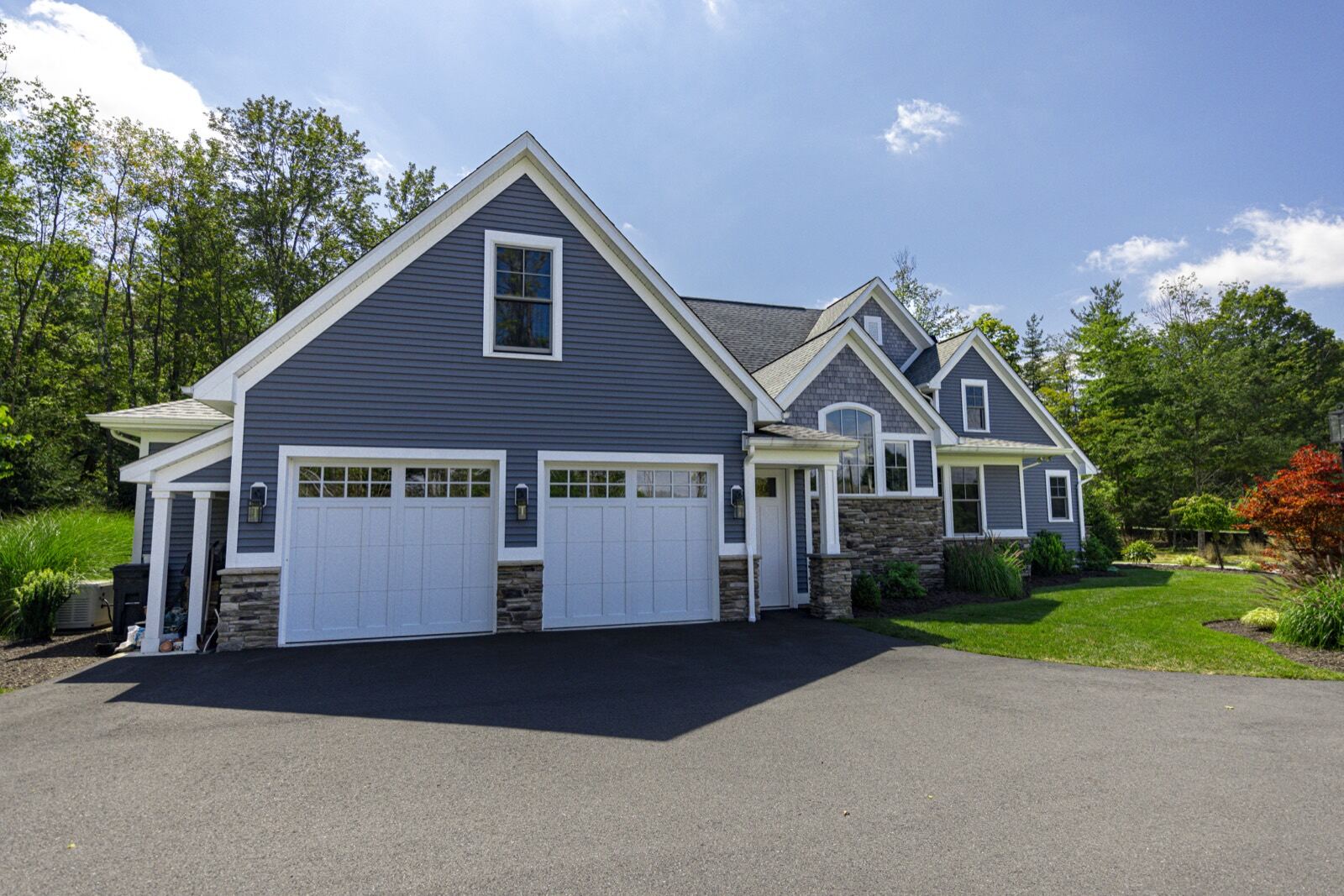 New roofing and siding on a custom home
